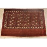 A Bokhara Juval rug, the main panel set