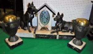 A 1930s marble and onyx cased clock garn