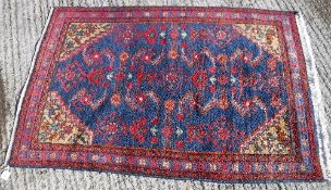 A Caucasian rug, the central panel set w