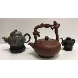A Chinese Yi Xing teapot with figural de