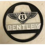 A modern painted cast metal sign "Bentle