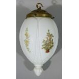 A large opaline glass hanging light of oval outline with moulded and floral transfer decorated