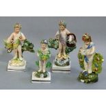 Four various late 18th century figures of infants, all carrying baskets or flowers standing before