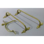 A Victorian brass latch and a pair of Victorian cast rope twist rails with trefoil back plates