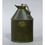 A metal cream flask with crew down brass cover the oval body applied brass label inscribed cream,