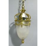 An Edwardian brass mounted frosted glass ceiling light pendant the crown with five foliate scroll
