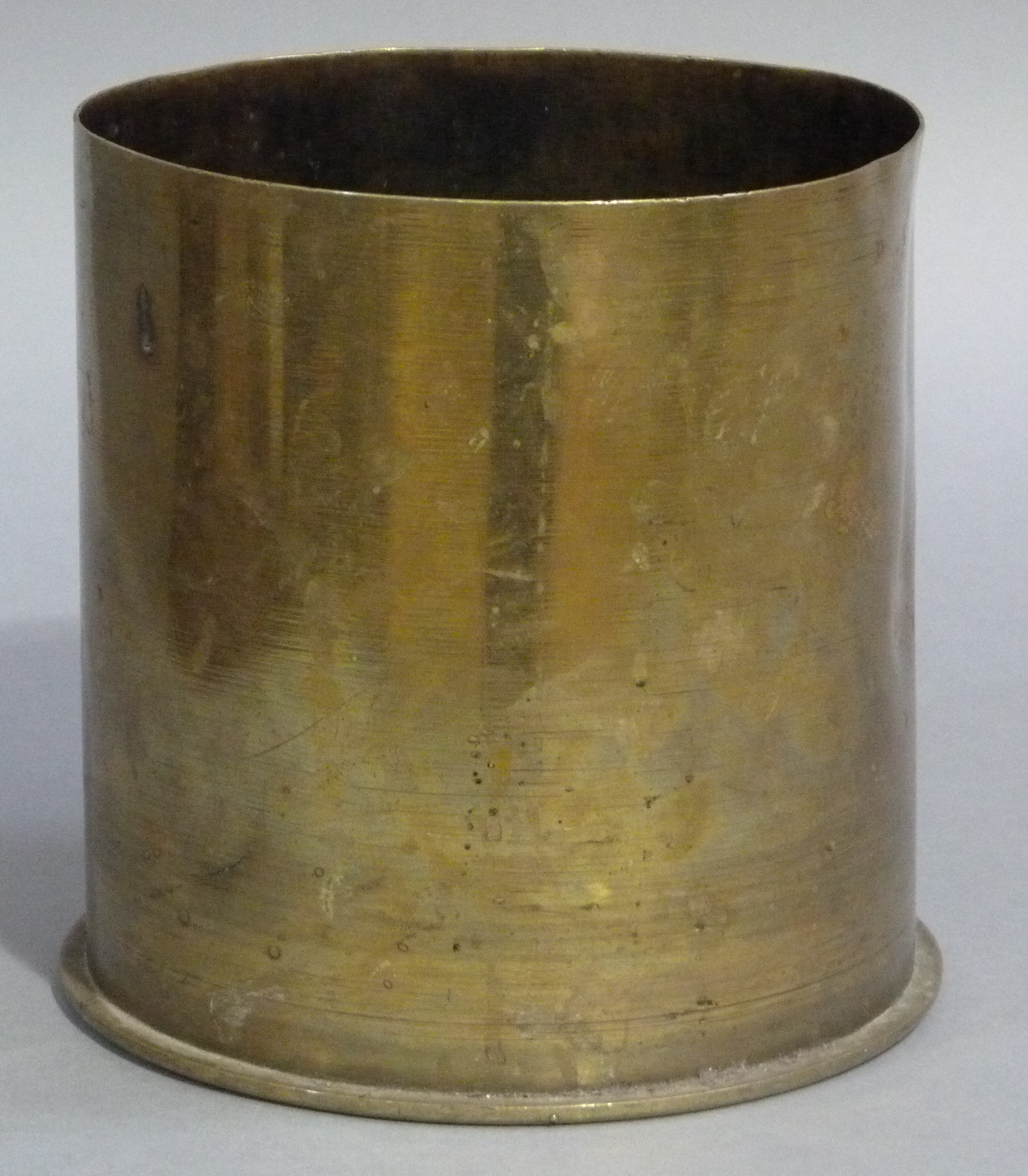 A 1st World War brass shell case, 23cm high