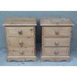 A pair of reproduction pine small chests of three drawers, shaped apron and bracket feet, 46cm