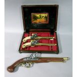 A reproduction flintlock pistol together with a pair of reproduction pistols, cased (3)
