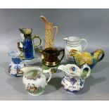 A Staffordshire copper lustre jug, a Mason's jug, three others, a Toby jug and a cockerel tea pot (
