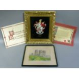 A needlework picture of Durham cathedral, together with an armorial crest for Holmes, gilt framed (