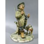 A Naples style bisque pottery figure of a huntsman with percussion rifle over his right shoulder,