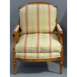 A reproduction stained beech armchair in Louis XVI style moulded frame upholstered back, arm pads