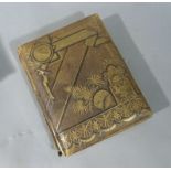 A Victorian gilt tooled leather musical photograph album with chromolithographic detailed shaped