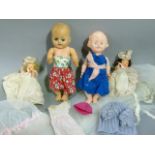 A small quantity of celluloid dolls in costume