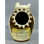 A late Victorian salt pot with hen in a nest finial, the circular opening moulded with stylised