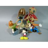 A quantity of Disney and other plastic figures