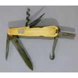 A bone faced penknife with steel blades vacant shield cartouche to one side, 11cm long