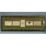 A set of five framed silk postcards in oak mount and gilt detailed ebonised frame, 26cm x 76cm