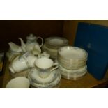 A quantity of Royal Doulton Juliet pattern dinner ware together with a Royal Worcester plate, boxed