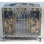 A George II style black chinoiserie display cabinet with rear upstand, central glazed door applied