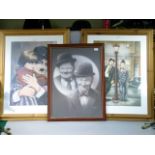 Three framed pictures of Laurel and Hardy, and Charlie Chaplin