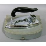 A globe trotter falks 300watt travel iron in original fitted case with fitments