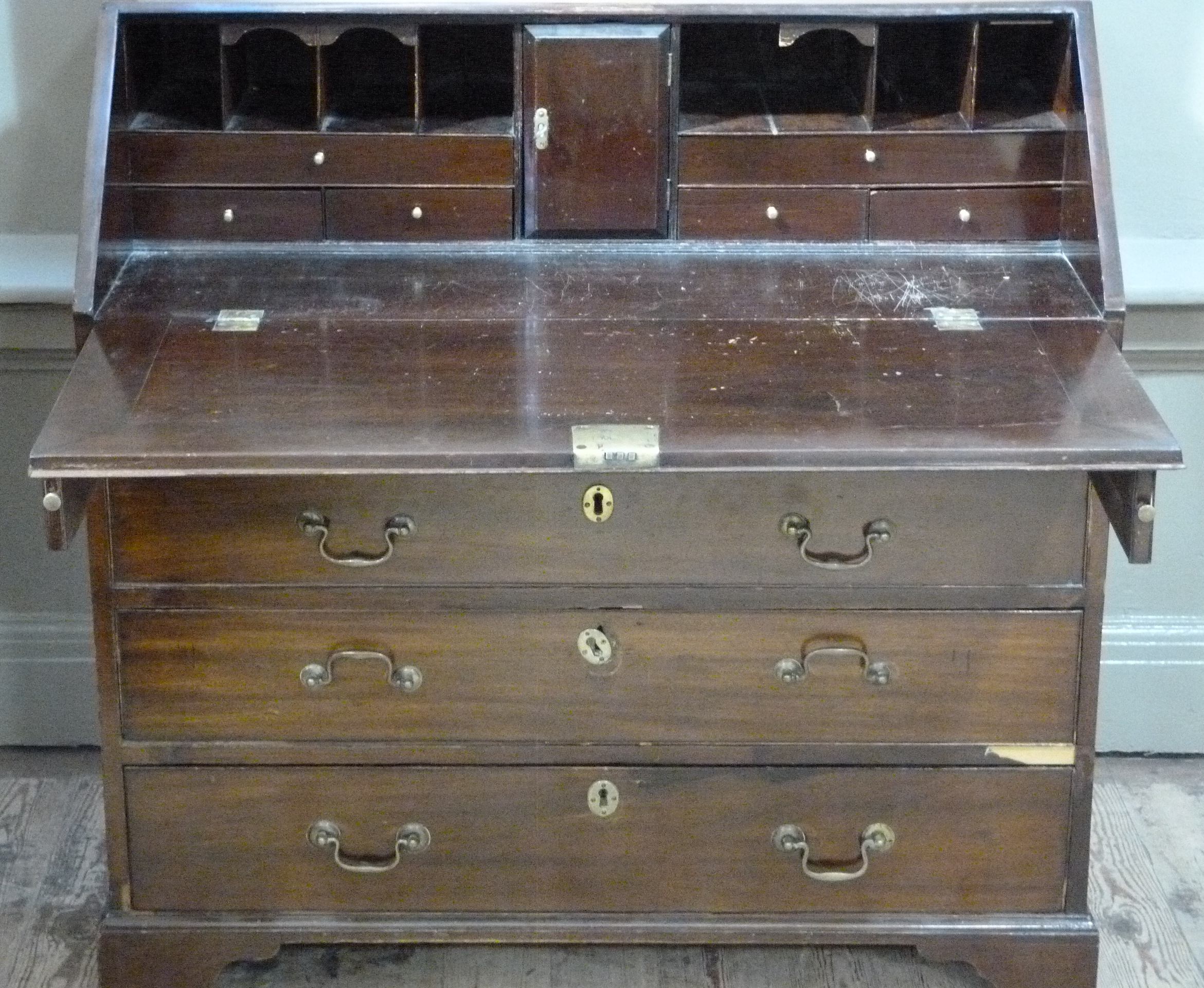 A George III mahogany bureau, the fall flap revealing conventionally fitted interior above pair of - Image 2 of 2