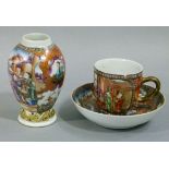 A Chinese porcelain cup and saucer the centre finely painted with figures standing and seated before