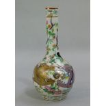 A Chinese famille rose bottle shaped vase the body decorated overall with dragons chasing the