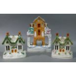 A Victorian flatback group - The Millhouse, 23cm high; a pair of Victorian pottery cottage ornees