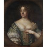 FOLLOWER OF SIR PETER LELY, portrait of a lady, half-length, in a blue gown, in a painted oval,