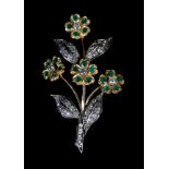 AN EMERALD AND DIAMOND SPRAY BROOCH the Old European and brilliant cut diamonds and circular faceted