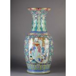 A LARGE CANTONESE VASE c.1850, the baluster form painted with figures on a terrace within a gilt-