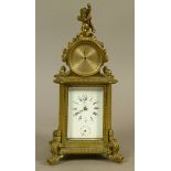 A 19TH CENTURY FRENCH BRASS MANTEL ALARM CLOCK AND BAROMETER, cast fluted case enclosing a white