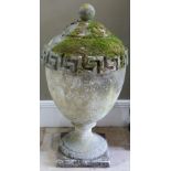 A RECONSTITUTED STONE GARDEN VASE IN GEORGE III STYLE, the urnular shaped body with Greek key