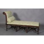 A 19TH CENTURY OAK DAY BED IN CAROLEAN STYLE, high foliate carved and moulded frame upholstered in