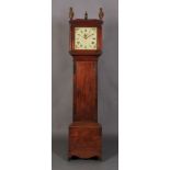 A GEORGE III MAHOGANY LONGCASE CLOCK with square hood with pair of gilt foliate urn and flambeau