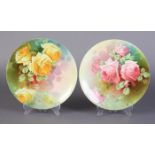A PAIR OF ROYAL DOULTON CABINET PLATES BY HARRY PIPER, one painted with pink roses, the other yellow