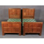 A PAIR OF THOMPSON OF KILBURN 'MOUSEMAN' OAK SINGLE BEDSTEADS c.1935-40, each having an eight-