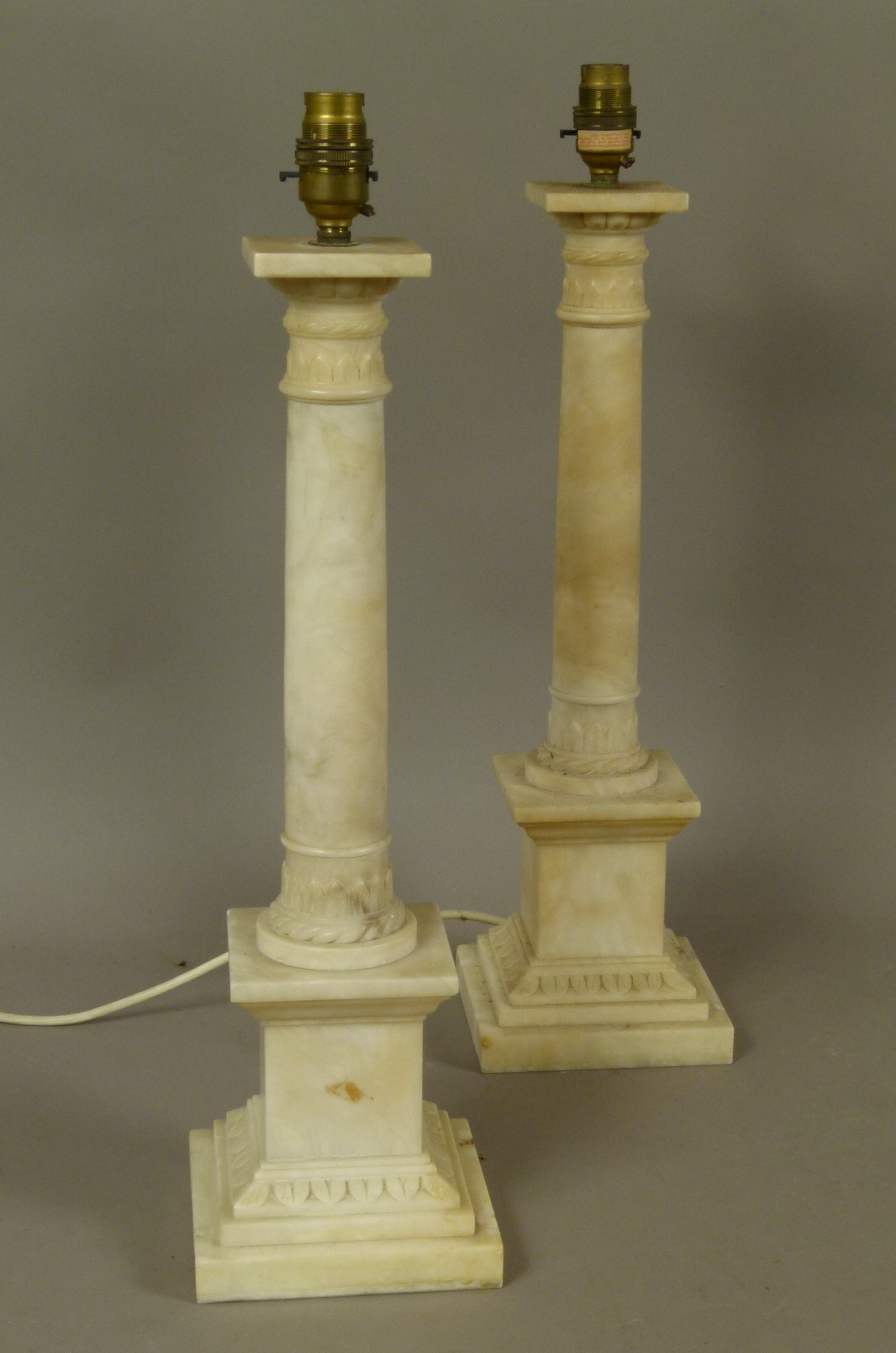 A PAIR OF ALABASTER COLUMN TABLE LAMPS with lobed and palmette carved capitals and conforming bases, - Image 2 of 2