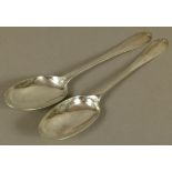 A PAIR OF GEORGE II SILVER DESSERT SPOONS, rat tail pattern, the backs engraved M.R, indistinct