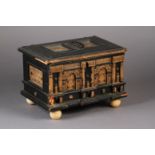 A FLEMISH EBONISED CASKET OF LATE 17TH CENTURY STYLE, rectangular, the front of architectural design