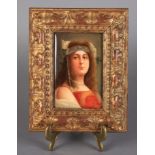 A VIENNA PORCELAIN RECTANGULAR PLAQUE, painted with a head and shoulder portrait of Hiawatha by