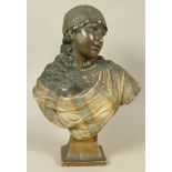 A 19TH CENTURY GOLDSCHEIDER GLAZED BLONDE TERRACOTTA BUST modelled as a young arab girl, head and