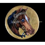 A 19TH CENTURY ENAMEL AND DIAMOND HORSE PORTRAIT BROOCH in 15ct gold, polychrome champlevé enamel