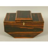 A REGENCY COROMANDEL WORK BOX of 'Ark' form, the front with kite shaped keyplate, hinged central lid