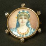 A 19TH CENTURY PORTRAIT MINIATURE DIAMOND BROOCH in 18ct gold, the polychrome female portrait