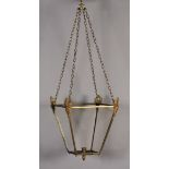 A 19TH CENTURY BRASS FRAMED HALL LANTERN of tapered square form, each corner clasped with a