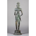 A FAR EASTERN BRONZE FIGURE of a crowned male figure, standing with right arm raised, left arm